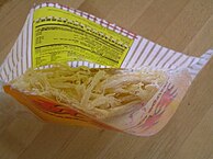 Commercially prepared dried shredded squid