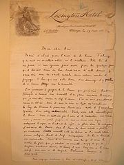 Lettre manuscrite avec en-tête d'un hôtel et illustration d'un soldat avec chapeau et fusil.