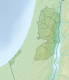 Mapa konturowa Palestyny, po prawej znajduje się punkt z opisem „Kumran”