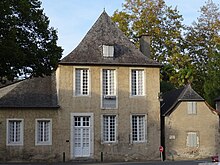 Photographie en couleurs d'une maison ancienne.