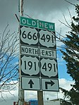 Old and new route numbers at the intersection with US 191 in Monticello