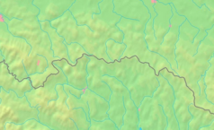 Mapa konturowa Beskidu Niskiego, po prawej znajduje się czarny trójkącik z opisem „Baba (Kanasiówka)”