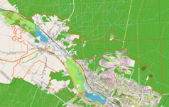 Mapa konturowa Wąchocka, po lewej znajduje się punkt z opisem „Parafia Wniebowzięcia NMP i św. Floriana”