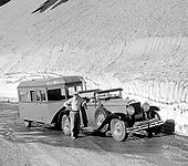 1929-30 Graham-Paige with early mobile camper trailer at Glacier National Park; December, 1933.