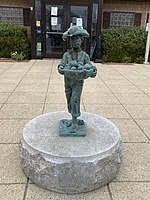 Statue of Johnny Appleseed welcoming travelers to the Johnny Appleseed Visitor and Information Center on Ma Hwy Rt 2 in Lancaster, Mass., near the birthplace of Johnny Appleseed.