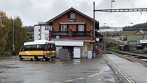 Two-story station building with gabled roof