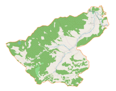 Mapa konturowa gminy Bystra-Sidzina, blisko lewej krawiędzi znajduje się punkt z opisem „źródło”, natomiast po lewej nieco na dole znajduje się punkt z opisem „ujście”