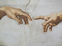 Hand of God reaching out to Adam who receives it