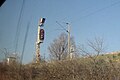 Le raccordement de la ligne Carnoules-Gardanne avec la ligne Marseille - Vintimille (vue en direction de Carnoules). Carré d'entrée à Carnoules et sémaphore mécanique de dos.