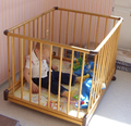 Traditionally shaped playpen with vertical bars