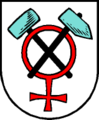 Der Name Hüttschlag und das Wappen mit Venussymbol (als Zeichen für Kupfer), Schlägel und Eisen verweisen auf den Bergbau