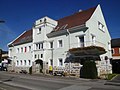 The Gemeindeamt of Altenberg bei Linz [de] at Reichenauer Straße 4, built by Mauriz Balzarek [de] from 1927 to 1930.