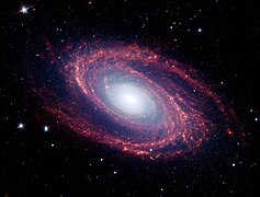 Imaxe da Galaxia de Bode (M81) polo Telescopio Espacial Spitzer, na que se pode observar po interestelar seguindo aproximadamente unha espiral logarítmica.