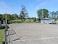 Un paddock de sable en sport équestre.