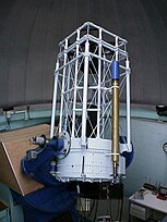 A large telescope in an observatory