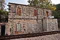 The old railway station of Dayr al-Shaykh, on the Jaffa–Jerusalem railway line, situated 0.5 km east of the village site.[3]