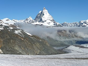 La Grant-Bèca viua dês les pentes du mont Rouése dedens les Ârpes pènines (Suisse). (veré dèfenicion 3 456 × 2 592*)