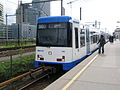 CAF-treinstel 75 op station Zuid in de wit-blauwe kleurstelling.