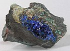 A shallow pocket of crystals of an intense cobalt blue, from Darwin, Darwin District, Inyo County, California, US