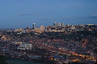 Panorama photograph of Kigali, including the towers of the CBD in the distance