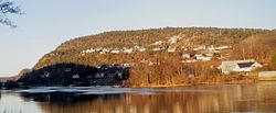 Sødal as seen from the river Otra