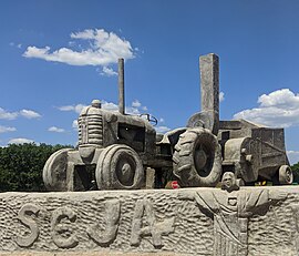 Escultura na entrada de Guzolândia