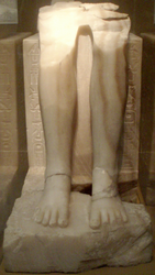 Fragmentary alabaster statue of Menkaura at the Boston Museum of Fine Arts.