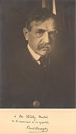 Paul Bourget dans ses dernières années, de face, moustache, portrait.