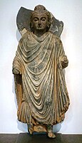 Standing Buddha sculpture, ancient region of Gandhara, northern Pakistan, 1st century CE, Musée Guimet.