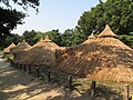 Reconstructed Neolithic-period huts in Amsa-dong, Gangdong District, Seoul