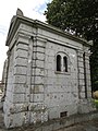 Funeral chapel, with bullet and shrapnel holes.