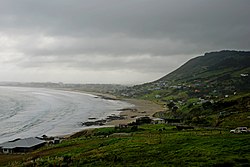 Ahipara Bay with Whangatauatia Maunga to the right