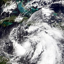 Satellite image of a tropical depression with a large area of thunderstorms