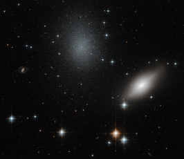 NGC 5011B (rechts) en NGC 5011C