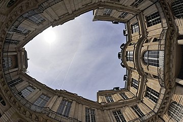 General view of the courtyard, showing its unusual oval shape