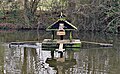 "Duckingham Palace" duck house on Widmore Pond, Sonning Common, UK.