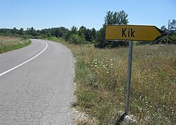 A sign at the entrance to the village Kik