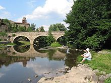 Bridge sa Senuire River ug St. André Abbey.