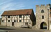 The Tudor Merchants Hall (l) and the West Gate (r)