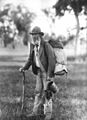 Image 34A swagman in bushman's apparel, wearing a brimmed hat and carrying swag and billy can (from Culture of Australia)