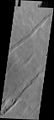 Oti Fossae, visto pela THEMIS. Esses grabens paralelos são encontrados no lado ocidental Arsia Mons; eles estão alinhados com a tendencia NE/SW dos três vulcões de Tharsis.