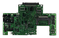 The TurboGrafx-16 motherboard bottom is sparse, sporting traces and a socket.