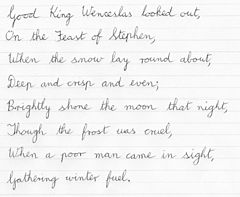 The first verse of "Good King Wenceslas" in cursive