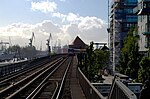 DT3E-Zug an der Station Baumwall (Elbphilharmonie) in Richtung Landungsbrücken