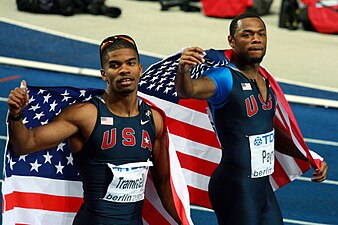 Terrence Trammell e David Payne, prata e bronze nos 110 m c/ barreiras.