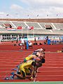 Image 7Men assuming the starting position for a sprint race (from Track and field)