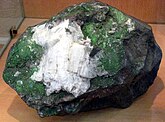 Chromite grains with white calcite grains