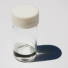 Sample of pivalonitrile in a vial