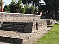 North altar to the side of the pyramid. The snake sculpture is between the two platforms