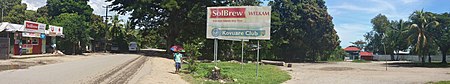 Entrance to Kovuare Club on Tandai Hwy. Facing West